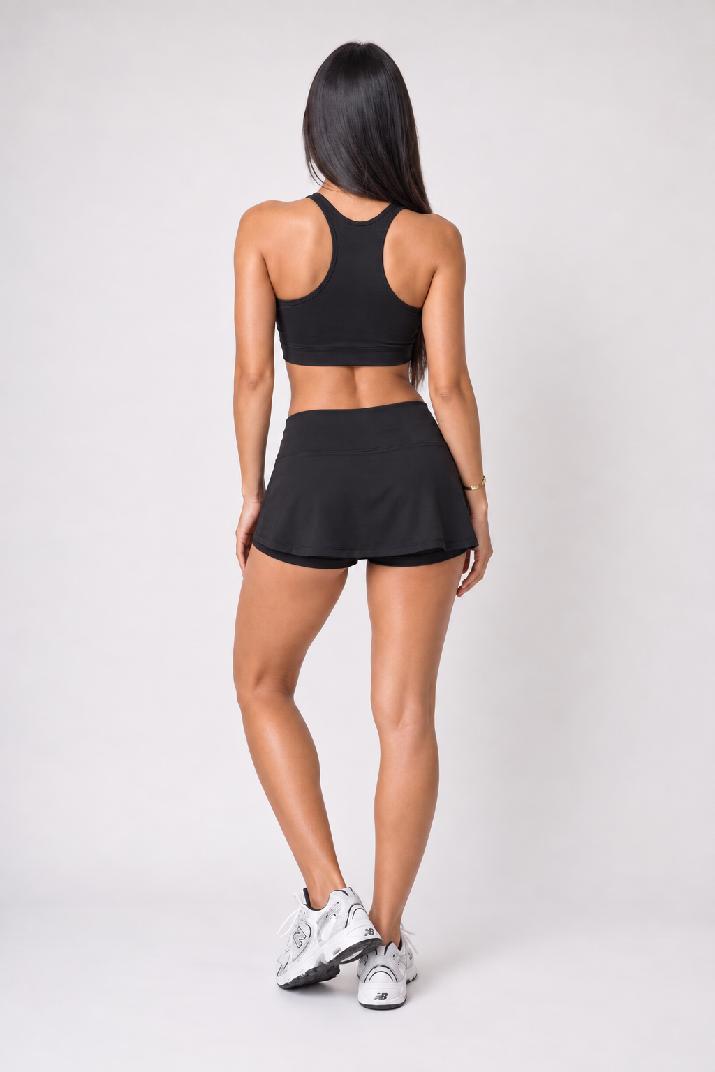 Conjunto Top Nadador e Shorts Saia - Preto
